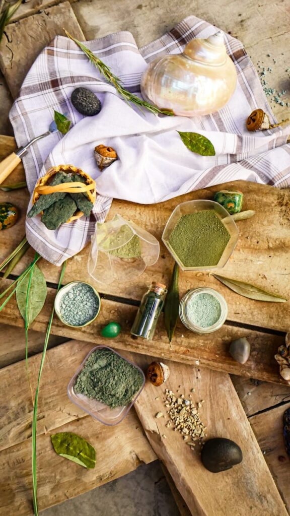 Colored Powder in Containers on Wooden Board