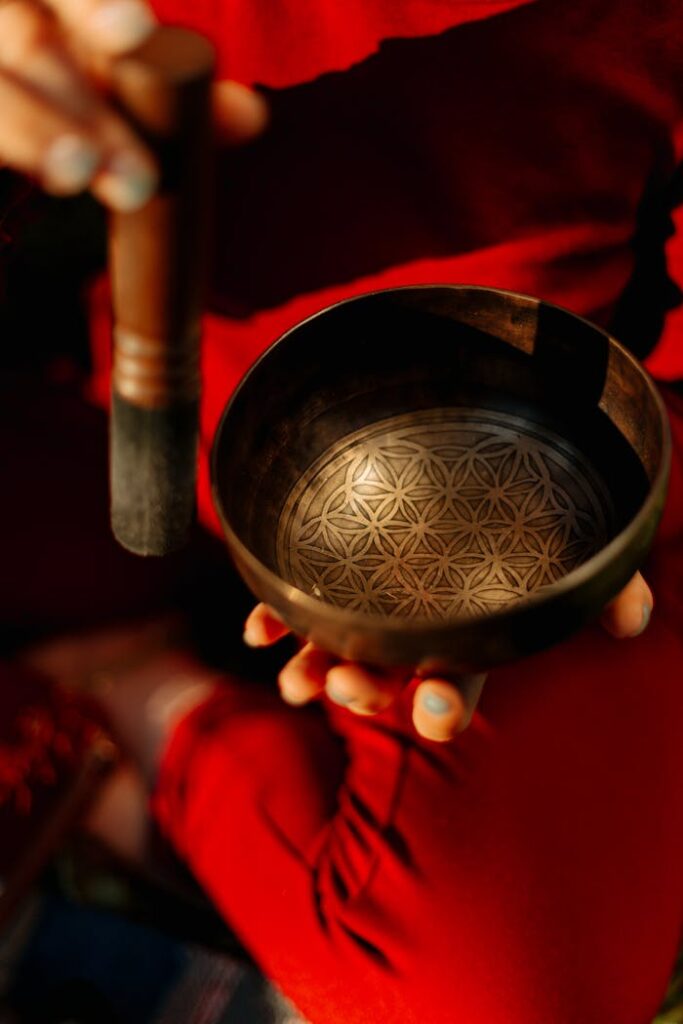 Monk Holding Tibetan Singing Bowl